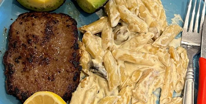 Schnitzel with alfredo pasta
