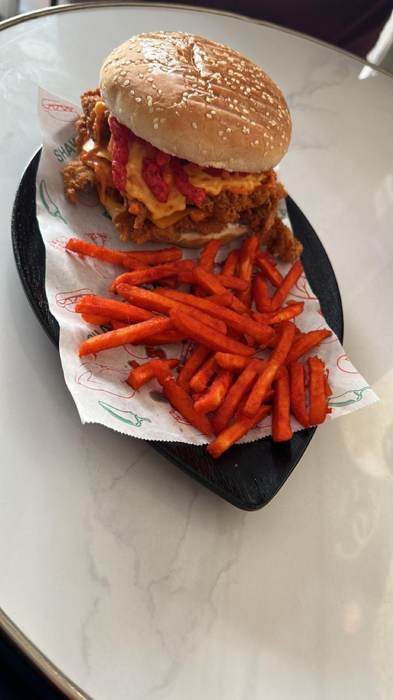 Burger with carrot sticks
