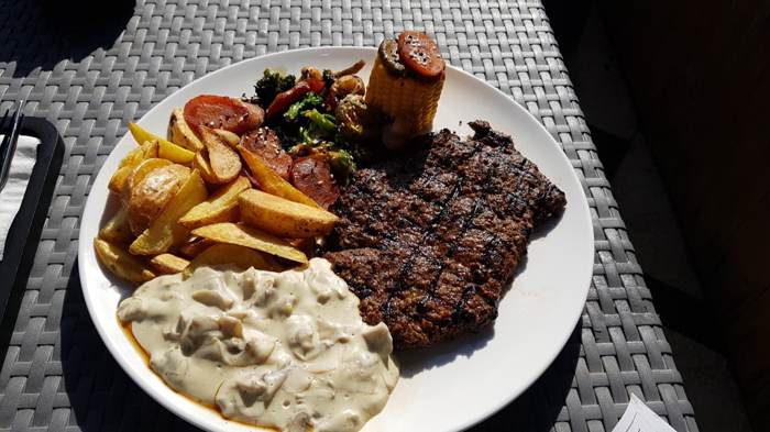 Meat with potatoes and sauce